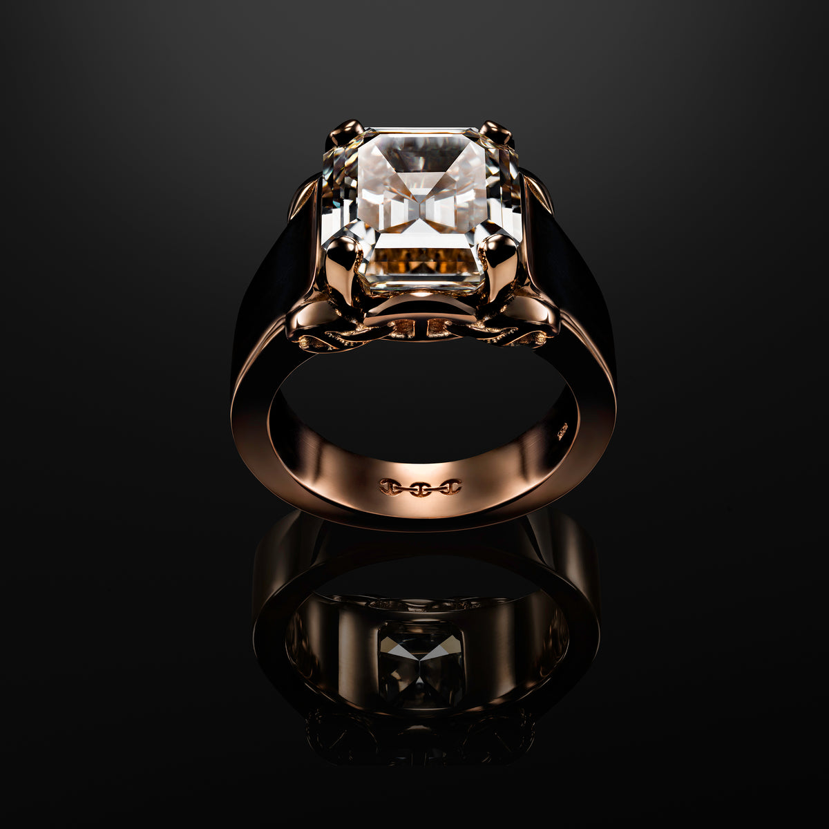 Spirit of Ecstasy ring in 18K rose gold with a square step-cut diamond